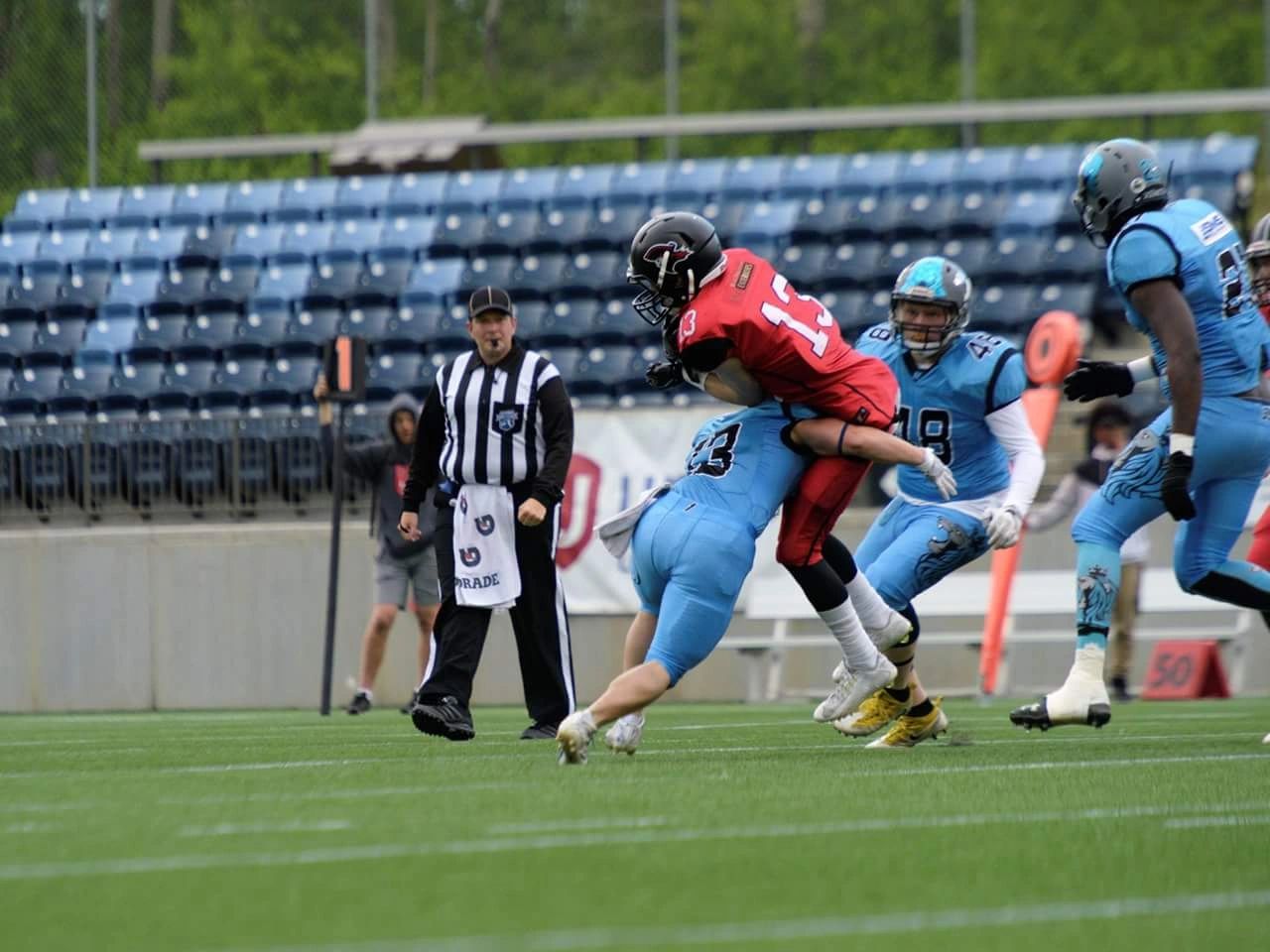 Monarchs defense wrapping up the ball carrier at SMS Stadium