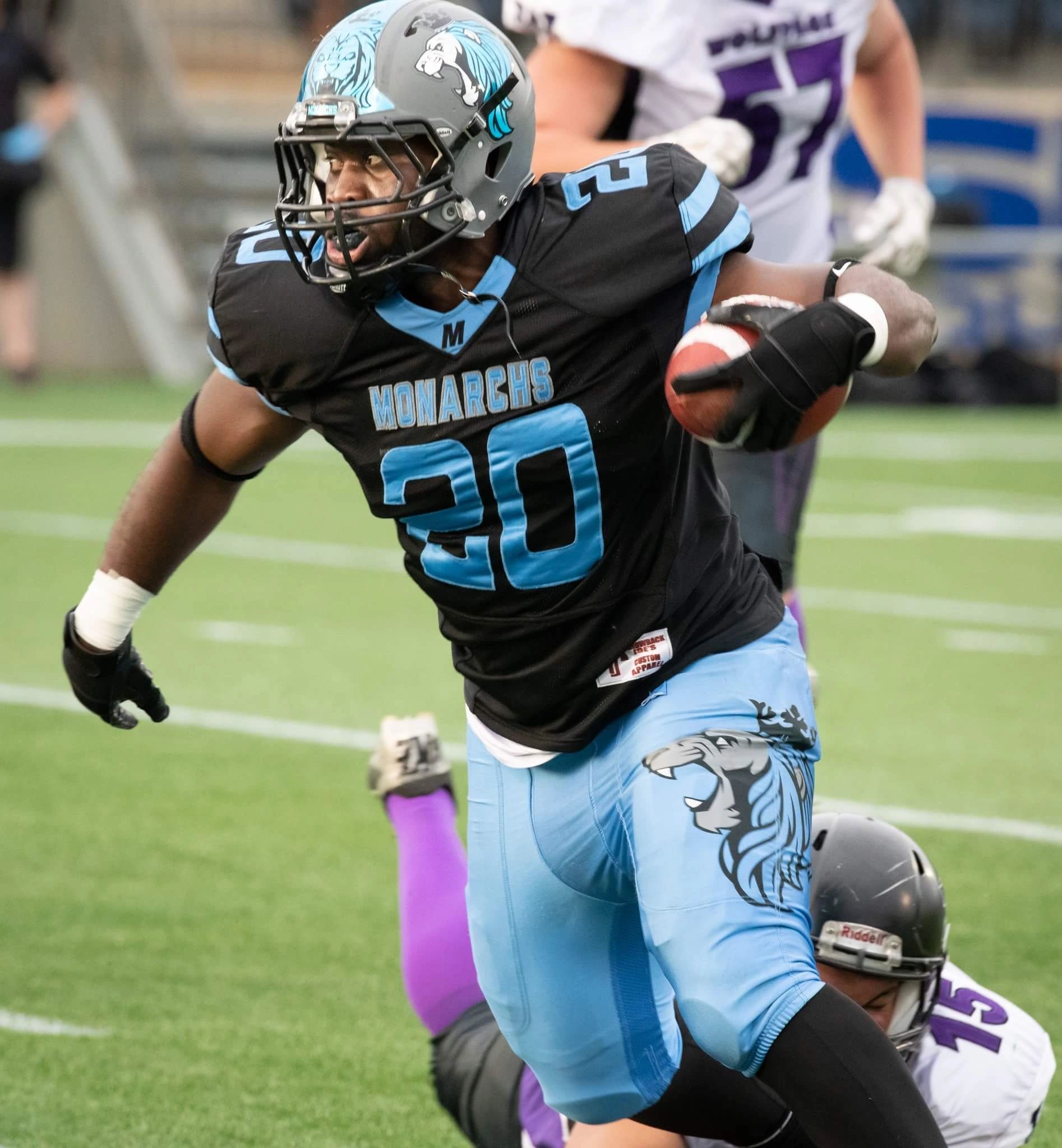 Monarchs #20 powering through a tackle at SMS Equipment Stadium