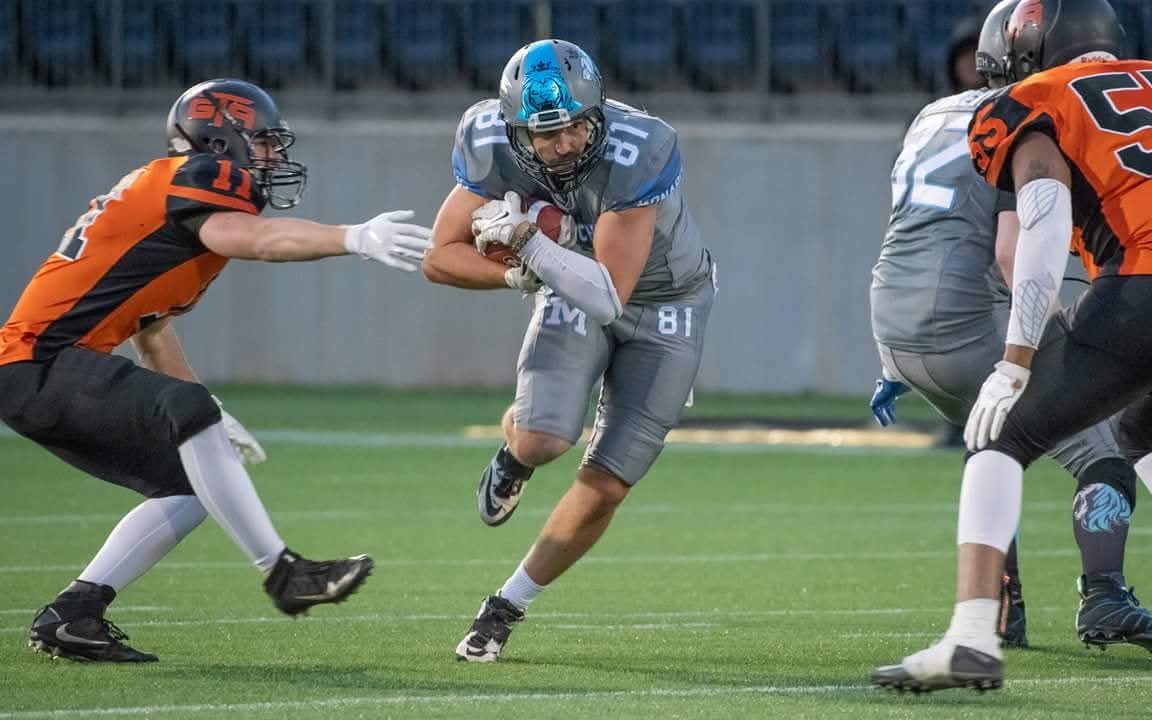 Monarchs receiver running through traffic